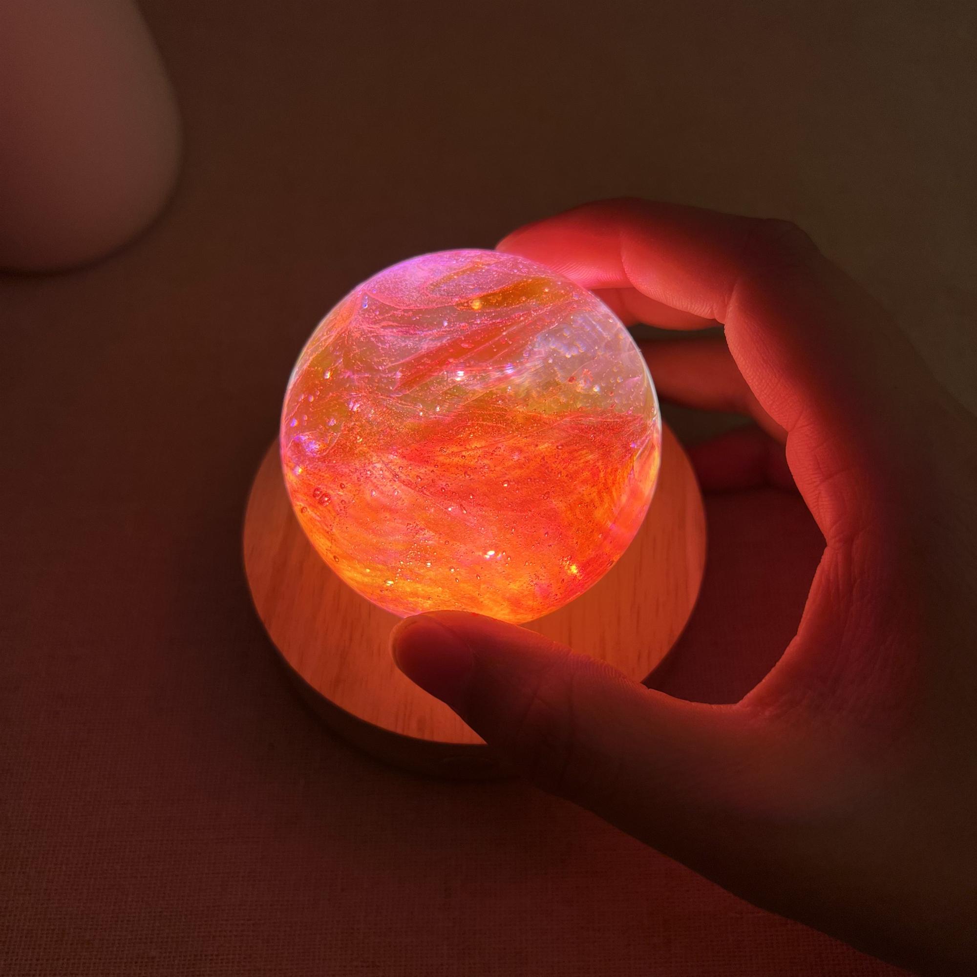 Illuminated Orange Galaxy Crystal Ball Night Light - Image 3